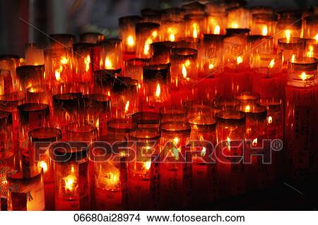 Picture - Red Chinese candles in Buddhist temple. Fotosearch