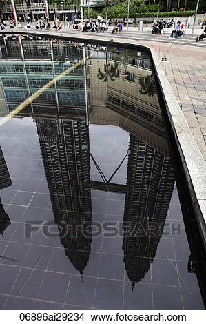 Reflection of the Petronas Twin Towers, Kuala Lumpur, Malaysia View Large Photo Image Picture - Reflection of the Petronas Twin Towers, Kuala Lumpur, Malaysia. Fotosearch