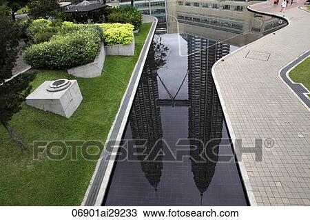 Stock Image - Reflection of the Petronas Twin Towers, Kuala Lumpur, Malaysia. Fotosearch