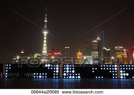 Shanghai city skyline at night with lit wall in foreground. China View Large Photo Image Stock Photography - Shanghai city skyline at night with lit wall in foreground. China. Fotosearch