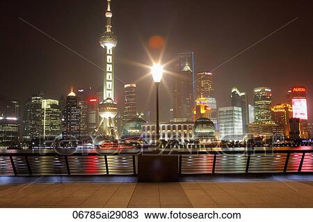 Shanghai city Skyline at night with lamp in foreground View Large Photo Image Stock Image - Shanghai city Skyline at night with lamp in foreground. Fotosearch