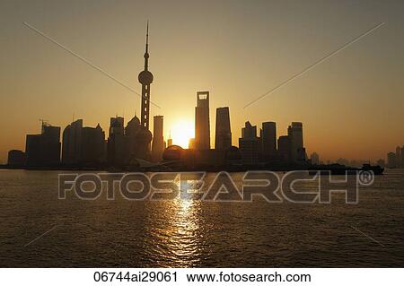 Shanghai skyline with Pearl Tower at sunrise, China View Large Photo Image Stock Image - Shanghai skyline with Pearl Tower at sunrise, China. Fotosearch