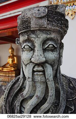 Stock Photo - Stone Statue at Wat Pho, Bangkok, Thailand. Fotosearch