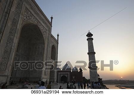 Sun setting behind the Taj Mahal, Agra, India View Large Photo Image Picture - Sun setting behind the Taj Mahal, Agra, India. Fotosearch