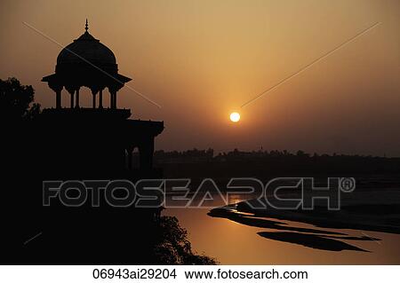 Picture - Sunset over the Taj Mahal and the River Yamuna, Agra, India. Fotosearch