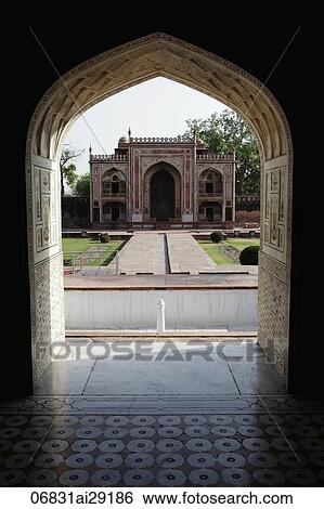 Stock Photograph - View from an archway of the Itmad-Ud-Daulah's Tomb or "Baby Taj", Agra, India. Fotosearch