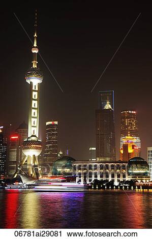 View of the Pearl Tower and Shanghai skyline at night. China View Large Photo Image Stock Image - View of the Pearl Tower and Shanghai skyline at night. China. Fotosearch
