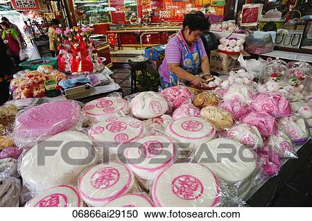 Woman preparing cakes, Chinatown, Bangkok, Thailand View Large Photo Image Stock Image - Woman preparing cakes, Chinatown, Bangkok, Thailand. Fotosearch