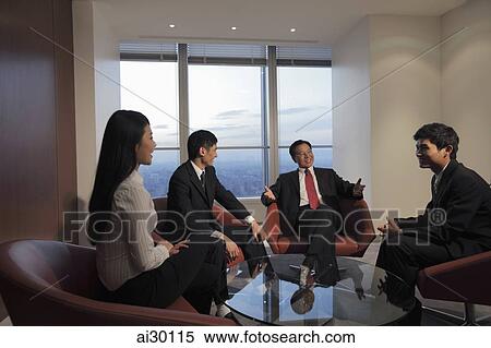 Four people having a meeting in an office View Large Photo Image Stock Photography - Four people having a meeting in an office. Fotosearch