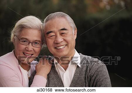 Head shot of older couple smiling together View Large Photo Image Stock Photo - Head shot of older couple smiling together. Fotosearch