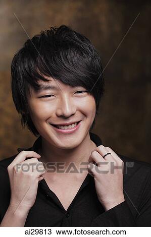 Head shot of young man smiling View Large Photo Image Stock Image - Head shot of young man smiling. Fotosearch