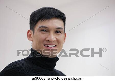 Head shot of young man smiling View Large Photo Image Stock Photo - Head shot of young man smiling. Fotosearch