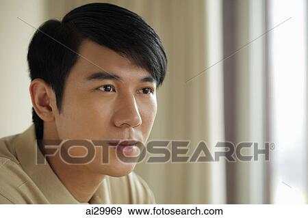 Head shot of young man View Large Photo Image Stock Photo - Head shot of young man. Fotosearch