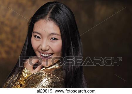 Head shot of young woman smiling View Large Photo Image Stock Photo - Head shot of young woman smiling. Fotosearch