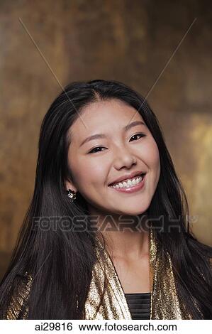 Head shot of young woman smiling View Large Photo Image Stock Photograph - Head shot of young woman smiling. Fotosearch