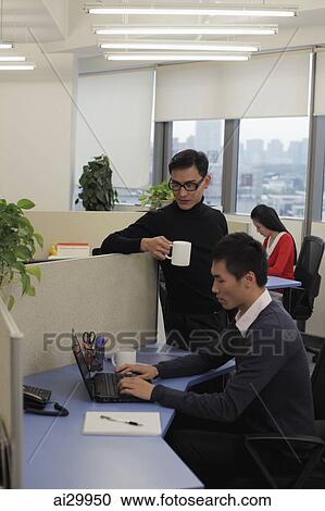 People working in an office together View Large Photo Image Stock Image - People working in an office together. Fotosearch