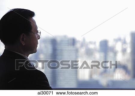 Profile of man wearing glasses looking out the window View Large Photo Image Stock Image - Profile of man wearing glasses looking out the window. Fotosearch