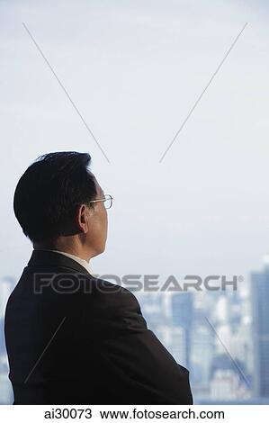 Profile of man wearing glasses looking out the window View Large Photo Image Stock Image - Profile of man wearing glasses looking out the window. Fotosearch