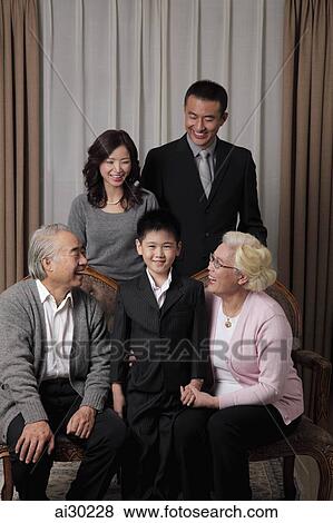 Three generation family dressed up laughing together View Large Photo Image Stock Photo - Three generation family dressed up laughing together. Fotosearch