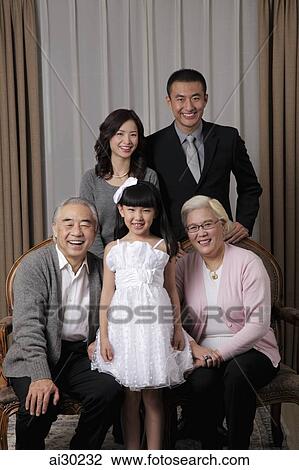 three generation family smiling together View Large Photo Image Stock Image - three generation family smiling together. Fotosearch