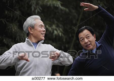 Two older gentlemen stretching together View Large Photo Image Stock Photo - Two older gentlemen stretching together. Fotosearch