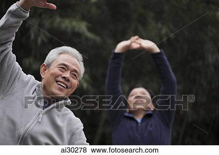 Two older men stretching outdoors View Large Photo Image Stock Photo - Two older men stretching outdoors. Fotosearch