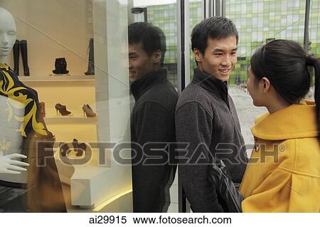 Young couple shopping together View Large Photo Image Stock Photography - Young couple shopping together. Fotosearch