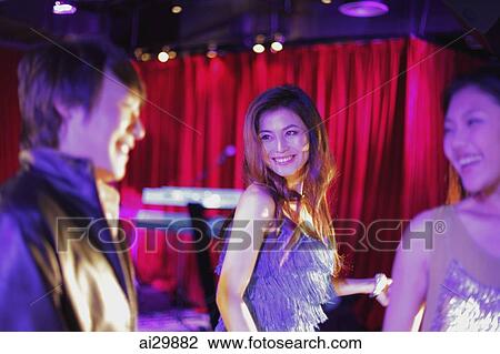 Young people dancing at night View Large Photo Image Stock Image - Young people dancing at night. Fotosearch