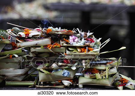 A pile of flower offerings at a Balinese temple View Large Photo Image Stock Image - A pile of flower offerings at a Balinese temple. Fotosearch