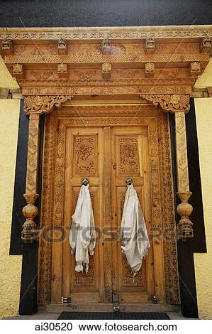 Stock Image - Carved wooden doors at Klu-Kkhyil Monastery, Ladakh, India. Fotosearch