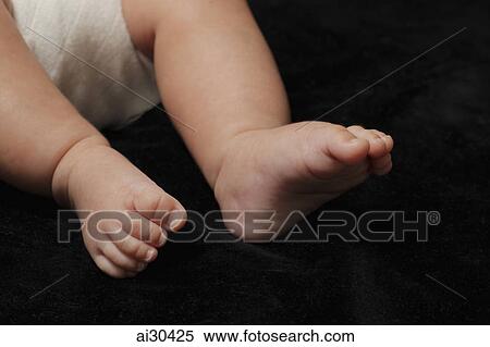 Close up of little baby's feet View Large Photo Image Stock Photography - Close up of little baby's feet. Fotosearch