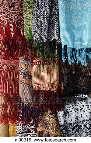 Colorful sarongs hanging in market / Indonesia, Bali View Large Photo Image Stock Photography - Colorful sarongs hanging in market / Indonesia, Bali. Fotosearch