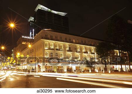 Light stream from traffic in front of the Hotel Continental at night, Ho Chi Minh, Vietnam View Large Photo Image Stock Photography - Light stream from traffic in front of the Hotel Continental at night, Ho Chi Minh, Vietnam. Fotosearch