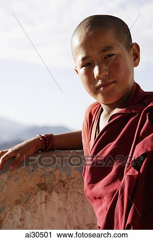 Stock Image - Portrait of young monk, Ladakh, India. Fotosearch