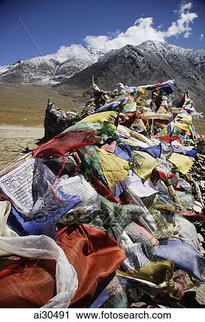 Stock Image - Prayer flags at Taglang La Pass, the second highest pass in the world, Ladakh, India. Fotosearch