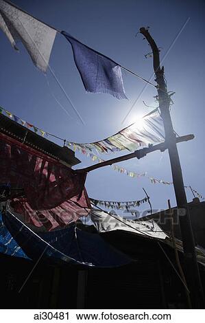 Prayer flags hanging in the town of Leh, Ladakh, India View Large Photo Image Stock Image - Prayer flags hanging in the town of Leh, Ladakh, India. Fotosearch