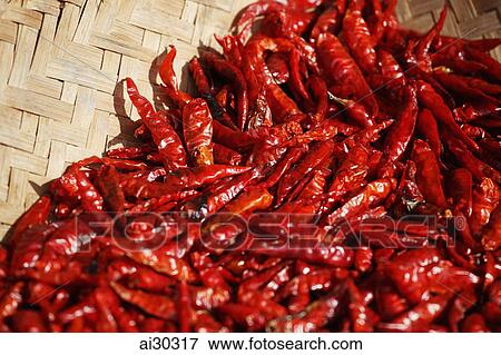 Red chillies in woven basket View Large Photo Image Stock Photo - Red chillies in woven basket. Fotosearch