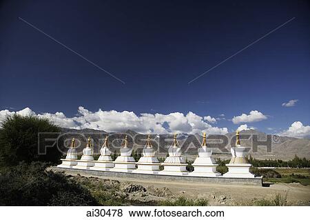 Row of stupas or chortens in Leh, Ladakh, India View Large Photo Image Stock Photo - Row of stupas or chortens in Leh, Ladakh, India. Fotosearch