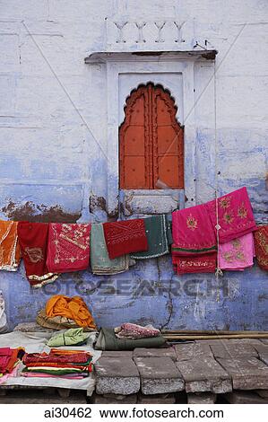 Stock Image - Saris for sale outside Sadar Market, Jodhpur, India. Fotosearch