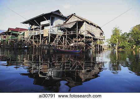 Stilt houses on a river, Siem Reap, Cambodia View Large Photo Image Stock Image - Stilt houses on a river, Siem Reap, Cambodia. Fotosearch