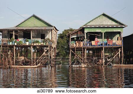 Stilt houses on a river, Siem Reap, Cambodia View Large Photo Image Stock Photo - Stilt houses on a river, Siem Reap, Cambodia. Fotosearch