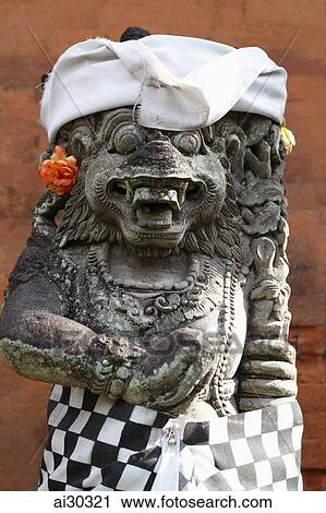 Stone carving of a Balinese God. Indonesia, Bali View Large Photo Image Stock Image - Stone carving of a Balinese God. Indonesia, Bali. Fotosearch