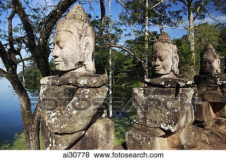 Stone carving of deities near a lake, Angkor Wat, Cambodia View Large Photo Image Stock Photo - Stone carving of deities near a lake, Angkor Wat, Cambodia. Fotosearch