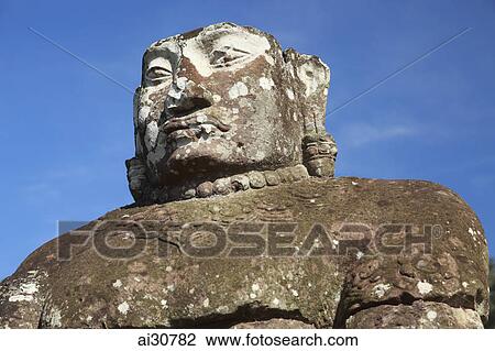 Stone carving of deity, Angkor Wat, Cambodia View Large Photo Image Stock Image - Stone carving of deity, Angkor Wat, Cambodia. Fotosearch