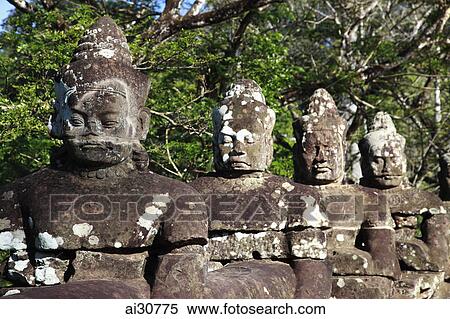 Stone carvings of deities, Angkor Wat, Cambodia View Large Photo Image Stock Photography - Stone carvings of deities, Angkor Wat, Cambodia. Fotosearch