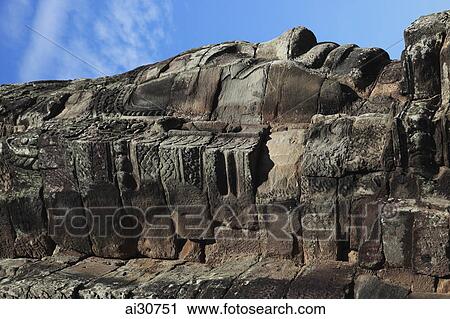 Stone face of Bayon Temple, Angkor Wat, Cambodia View Large Photo Image Stock Image - Stone face of Bayon Temple, Angkor Wat, Cambodia. Fotosearch