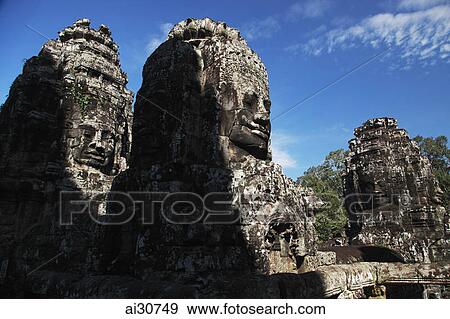 Stone faces of Bayon Temple, Angkor Wat, Cambodia View Large Photo Image Stock Photo - Stone faces of Bayon Temple, Angkor Wat, Cambodia. Fotosearch