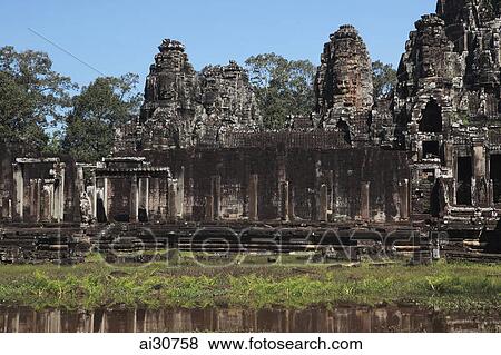 Stock Photo - Stone ruins of Bayon Temple, Angkor Wat, Cambodia. Fotosearch