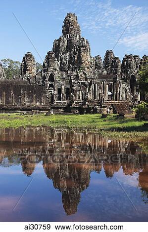 Stock Photo - Stone ruins of Bayon Temple, Angkor Wat, Cambodia. Fotosearch