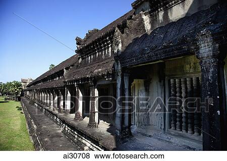 Stock Photo - Stone wall of Angkor Wat, Cambodia. Fotosearch